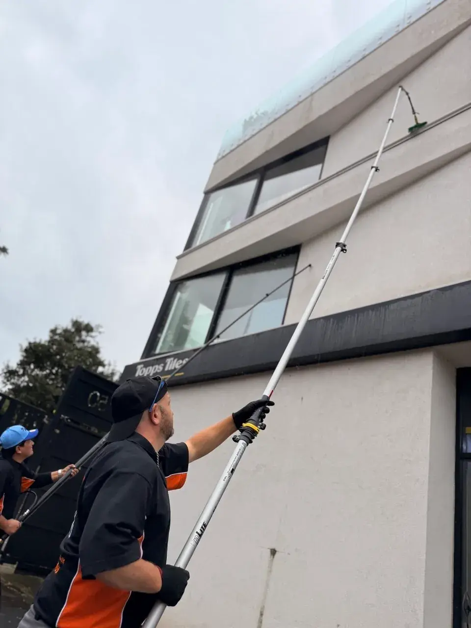 Commercial window cleaning with a water-fed pole