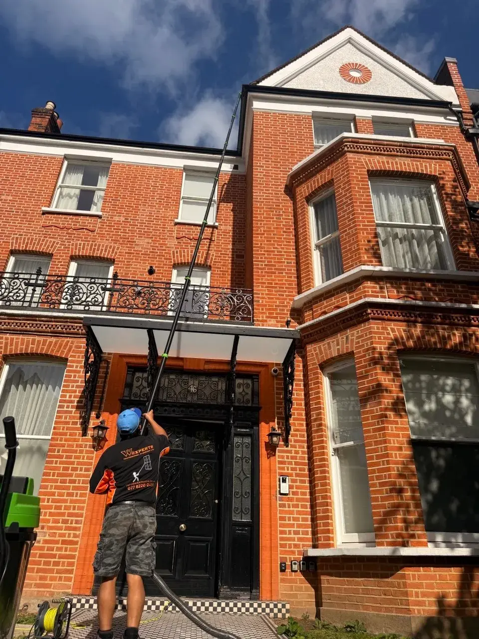 Victorian home with gutters cleared by WrXperts